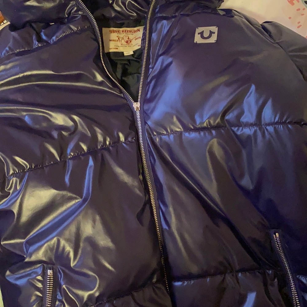 This is an old Winter Jacket  ! Size Large, True Religion Brand.